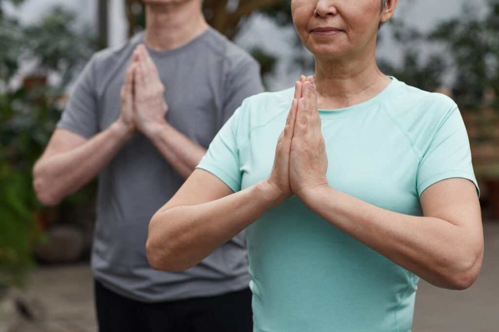 Active adults stretching after a workout while using CBD recovery products in Parkland, FL
